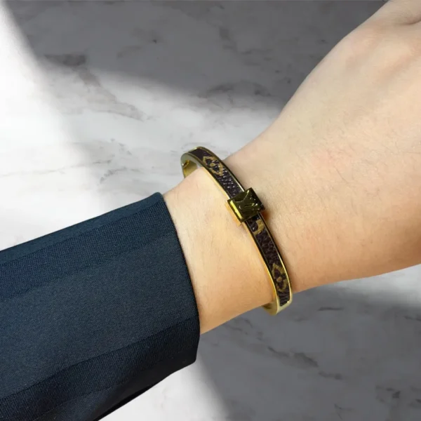 Goldtone Louis Vuitton Bracelet with Iconic LV Design - Image 5